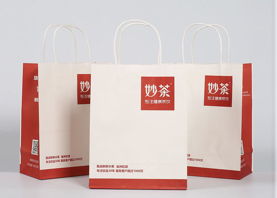 Le rouge a imprimé les sacs décoratifs, coutume réutilisés emportent les sacs à provisions de papier