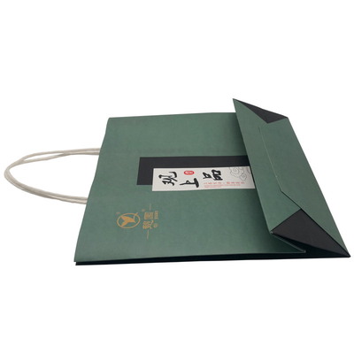 La compensation Papier d'emballage a imprimé des sacs en papier que les poignées de coton repèrent recyclable UV
